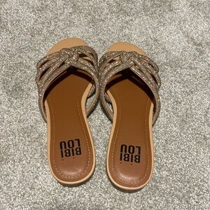 Bibi Lou Woman’s sparkly flat sandals